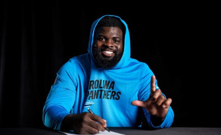 Here are a few 10-word scroll-stopping options:

Future Secured! Second-Round Pick Lee Hunter Signs Rookie Deal.
It’s Official! Second-Rounder Lee Hunter Inks Rookie Contract.
Get Ready! Lee Hunter, Second-Rounder, Signs On The Dotted Line.
Hunter Signed! Our Second-Round Talent Locks In Rookie Contract.
 | Vibe NC