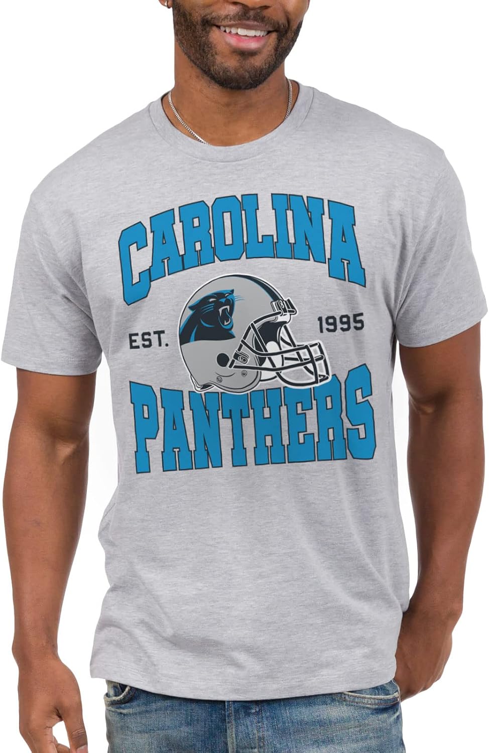 Here are 5 options for a 10-word scroll-stopping headline:

Official Team Helmet. Junk Food Style. Your Must-Have Football Fan Tee.
Game Day Ready! Officially Licensed Junk Food Football Helmet Fan Tee.
Retro Helmet Design. Official Junk Food Fan Shirt. Own Your Team!
Ultimate Fan Gear! Officially Licensed Junk Food Football Team Helmet Tee.
Wear The Icon! Official Junk Food Team Helmet Football Fan Apparel.
 | Vibe NC