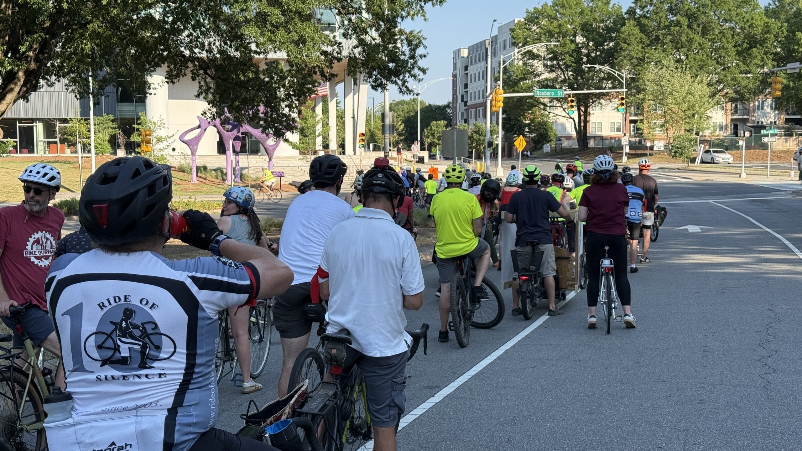 Create a 10-word scroll-stopping headline for: Durham Cyclists Mourn Traffic Deaths During Memorial Ride | Vibe NC
