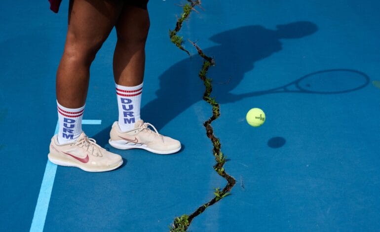 Here are a few 10-word options:

Durham’s thriving tennis roots deserve better courts for booming growth.
Durham tennis: Growth explodes, but courts crumble. Players demand action!
Deep roots, surging growth: Durham tennis needs courts to match!
Durham tennis players: Our deep roots deserve courts matching growth!
Durham’s booming tennis community seeks courts worthy of its legacy.
 | Vibe NC