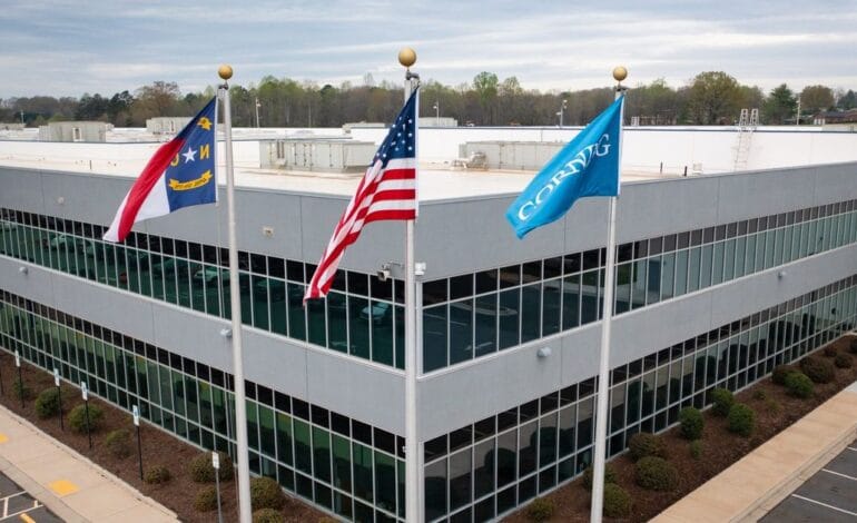 Create a 10-word scroll-stopping headline for: Amazon and Corning partner to boost fiber optics manufacturing in North Carolina :: WRAL.com | Vibe NC