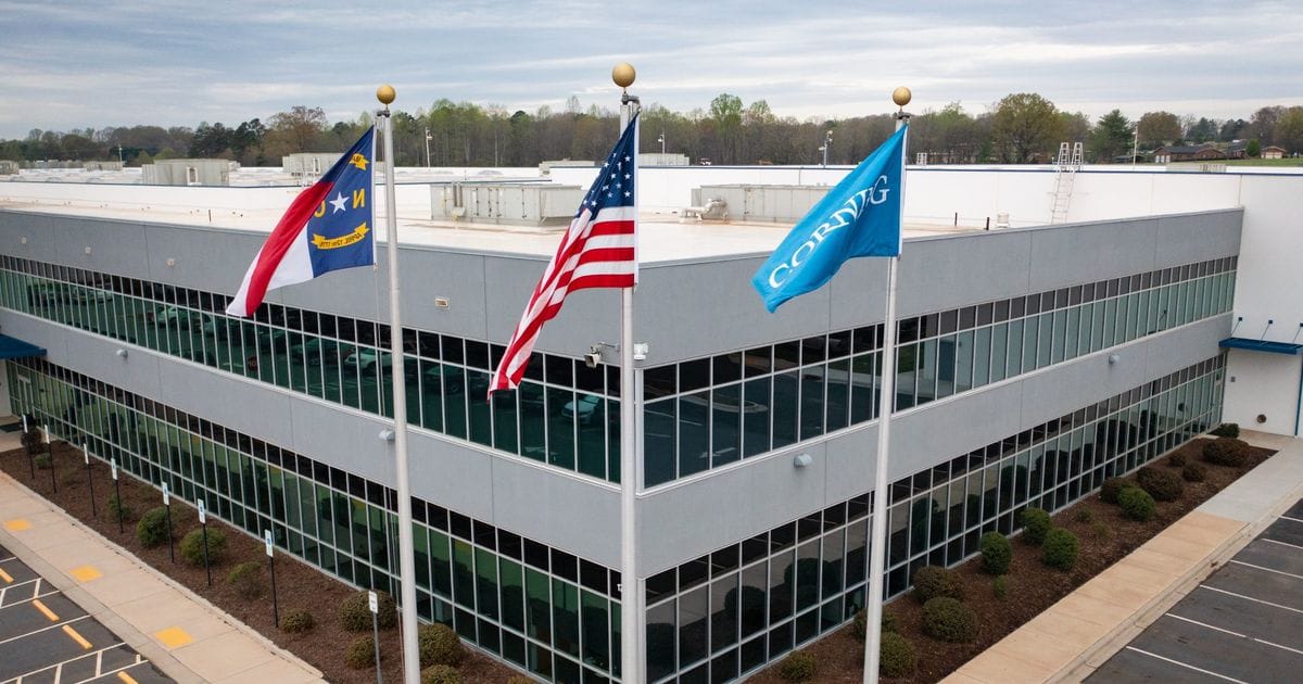 Create a 10-word scroll-stopping headline for: Amazon and Corning partner to boost fiber optics manufacturing in North Carolina :: WRAL.com | Vibe NC