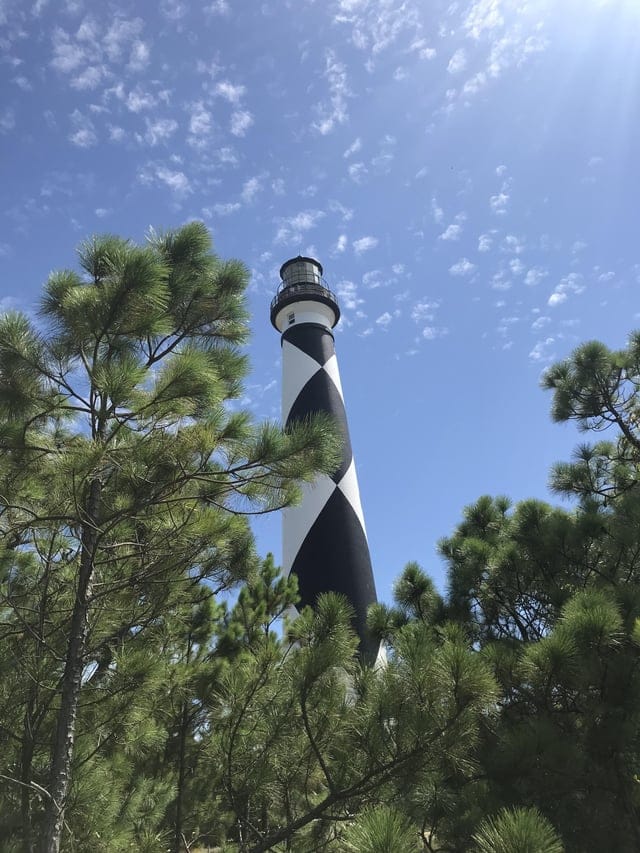 Create a 10-word scroll-stopping headline for: Cape Lookout | Vibe NC