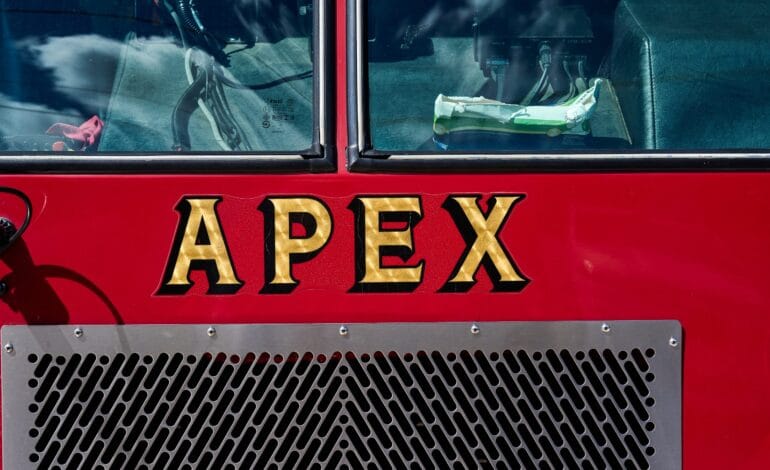 Create a 10-word scroll-stopping headline for: Apex passes $262 million budget with tax increase | Vibe NC