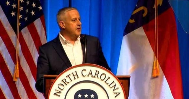 Create a 10-word scroll-stopping headline for: ‘Jacksandrei Blakenekov’: Pro-Hurricanes post by US Senate candidate skewered by NC fans over AI use | Vibe NC