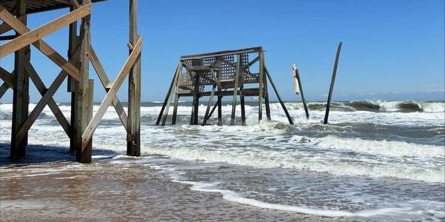 Create a 10-word scroll-stopping headline for: Home collapses in Buxton, beach access temporarily closed | Vibe NC