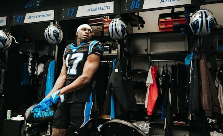 Create a 10-word scroll-stopping headline for: Xavier Legette on trail rides, Panthers’ teammate bonding, and not having a repeat of 2025 | Vibe NC
