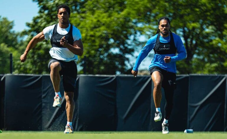 Create a 10-word scroll-stopping headline for: Chuba Hubbard, Jonathon Brooks, and the bond carrying both through the offseason | Vibe NC