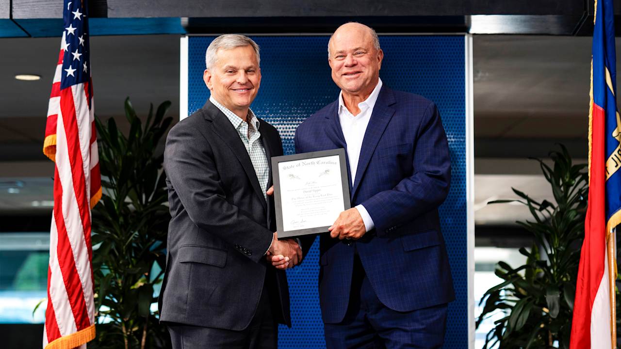 Create a 10-word scroll-stopping headline for: David Tepper honored with Order of the Long Leaf Pine by Governor Josh Stein  | Vibe NC
