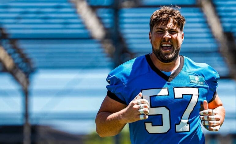Create a 10-word scroll-stopping headline for: Second week of Panthers’ OTAs have elevated Monroe Freeling’s game | Vibe NC