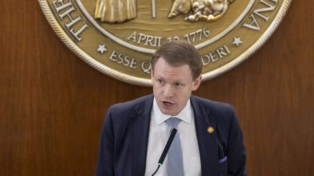 Create a 10-word scroll-stopping headline for: NC Republicans override Gov. Stein’s vetoes on DEI bans, immigration enforcement | Vibe NC