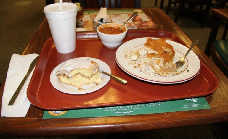 Here are a few options, playing on different angles:

Your money buys this? NC Legislature cafeteria secrets revealed.
Lunch Money: Do NC Legislators eat better than you?
Taxpayers’ Tab: What NC Legislators really eat for lunch.
Secrets served daily: Inside NC’s powerful political cafeteria.
Power plays, actual plates: NC Legislature’s surprising lunch habits.
 | Vibe NC