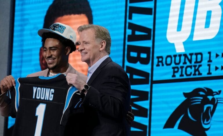 Here are a few options, hitting that 10-word limit:

Panthers Trio: Young, Brown, McMillan Reveal NFL Draft Success Secrets.
Panthers Stars Share Critical Advice for NFL Draft Prospects.
Unlock Your NFL Draft Path: Panthers’ Young, Brown, McMillan Advise.
Hear It Now: Panthers’ Young, Brown, McMillan Drop Draft Day Truths.
Panthers’ Young, Brown, McMillan Guide Prospects: Essential Draft Wisdom.
 | Vibe NC