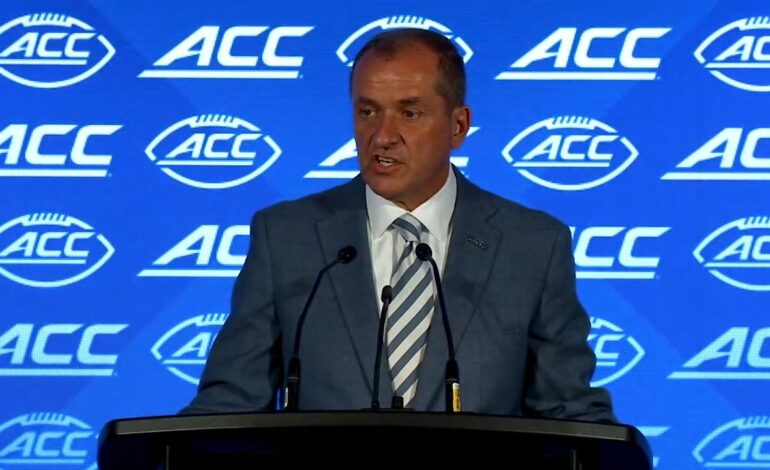 Here are a few 10-word scroll-stopping headlines:

ACC Seeks Corporate Millions: Bold Plan to Boost League Revenue.
Can Corporate Sponsors Save the ACC? New Money Hunt Begins.
ACC’s Big Play: Corporate Partnerships Target Major Revenue Growth.
Dollars Over Diamonds: ACC Chases Corporate Cash for League Boost.
ACC’s Future Hinges on Corporate Cash: Big Revenue Push!
 | Vibe NC