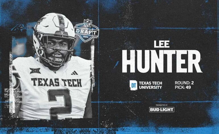 Here are a few options for a 10-word scroll-stopping headline:

Panthers Trade Up: Their Man, Defensive Tackle Lee Hunter.
Panthers Make Big Move! Trade Up for DT Lee Hunter.
They Wanted Him! Panthers Trade Up For Defensive Tackle Lee Hunter.
Panthers Grab Their Guy: Defensive Tackle Lee Hunter Acquired!
Panthers Aggressively Trade Up, Land Defensive Tackle Lee Hunter.
 | Vibe NC
