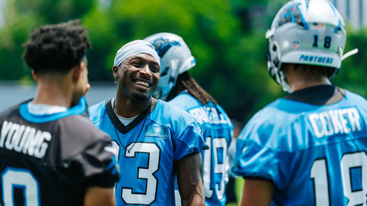 Here are a few options, playing with different angles within 10 words:

Panthers’ Secret Weapon: Moore’s Wit Shapes Receiver Unit’s Rise.
Beyond Catches: Moore’s Wisdom Forges Panthers’ Receiver Unit.
Moore’s Masterclass: Wit and Wisdom Transforming Panthers’ Receivers.
The Brains Behind Panthers’ Receivers: David Moore’s Unseen Impact.
Panthers’ Mind Game: David Moore Elevates Receiver Unit With Wit.
 | Vibe NC