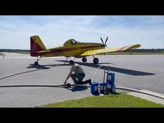 Create a 10-word scroll-stopping headline for: NC Forest Service air support center at Washington NC Airport for Hyde’s Rose Bay Fire, June 2026. | Vibe NC